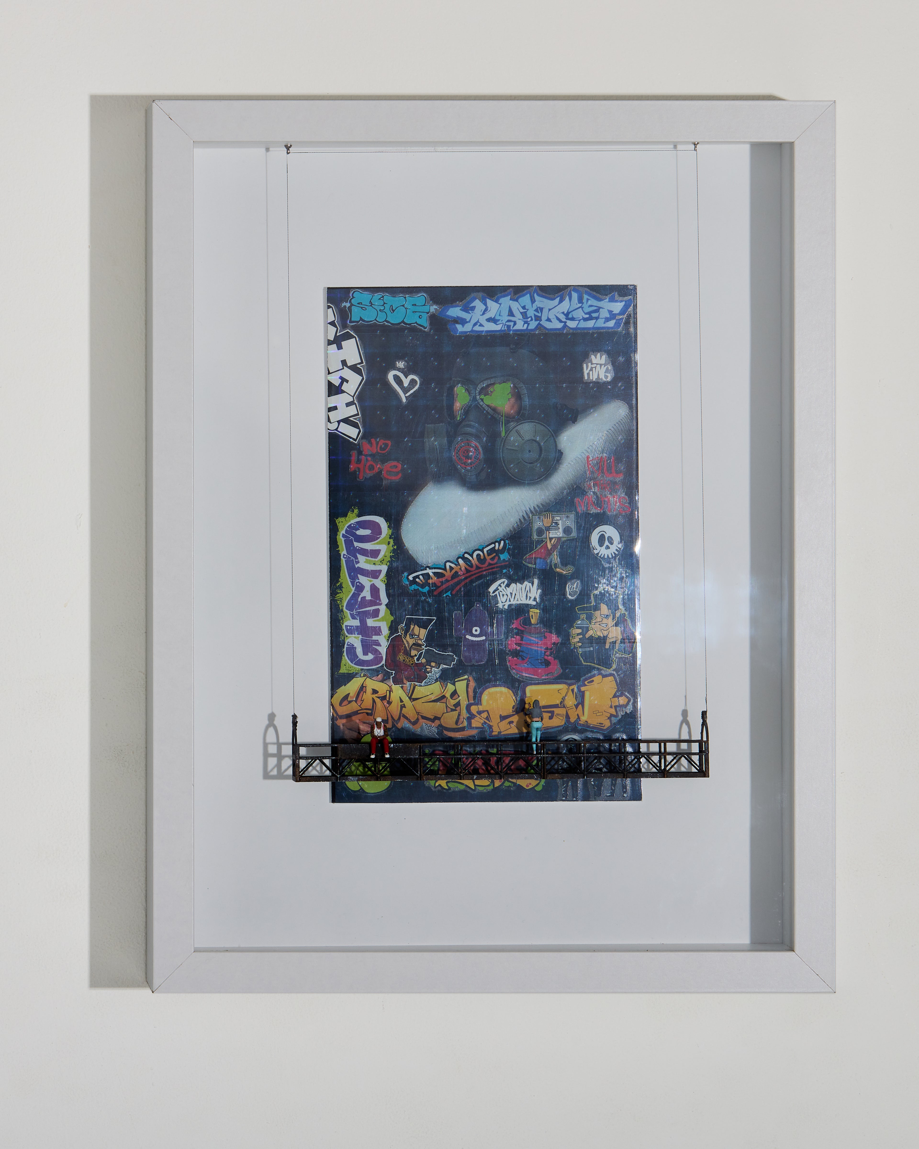 Shadow box contemporary pop art composition featuring portrait of a queen from the 1800's wearing a modern gas mask. There is a platform with two miniature figurines finishing some graffiti